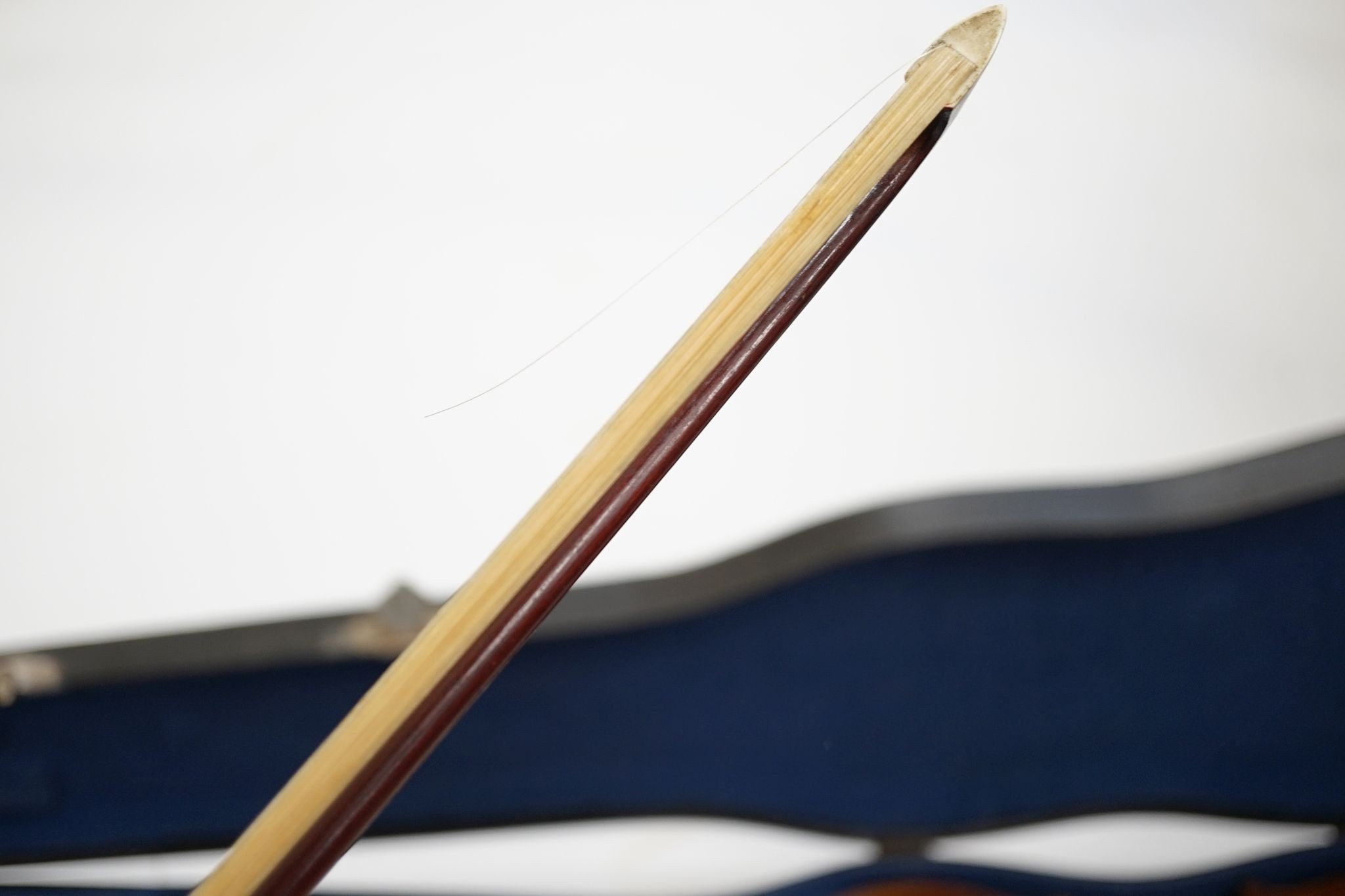 A Maidstone violin, with bow, cased., violin 59 cms high.